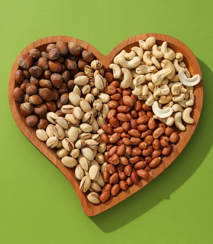 Heart Shaped bowl containing dry fruits and nuts